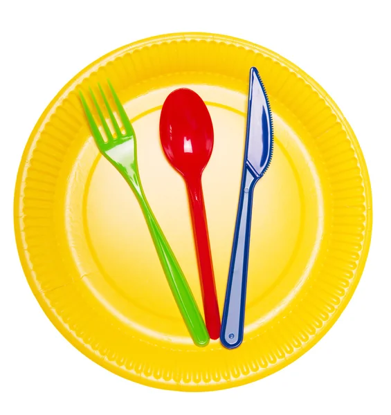Set piatti monouso luminosi: piatto, cucchiaio, forchetta e coltello isolato . — Foto Stock