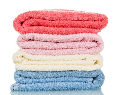 Four of terry towels different colors isolated on white. clipart