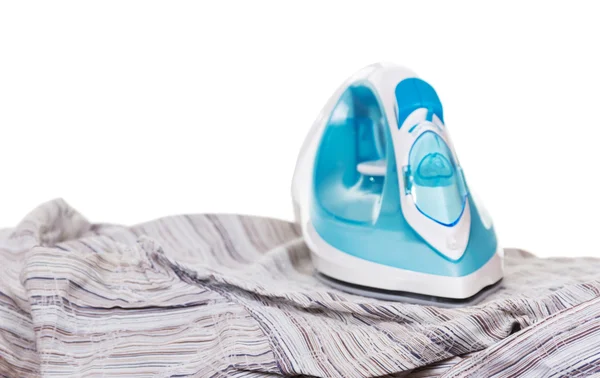 Blue steam iron and shirt on white background. — Stock Photo, Image