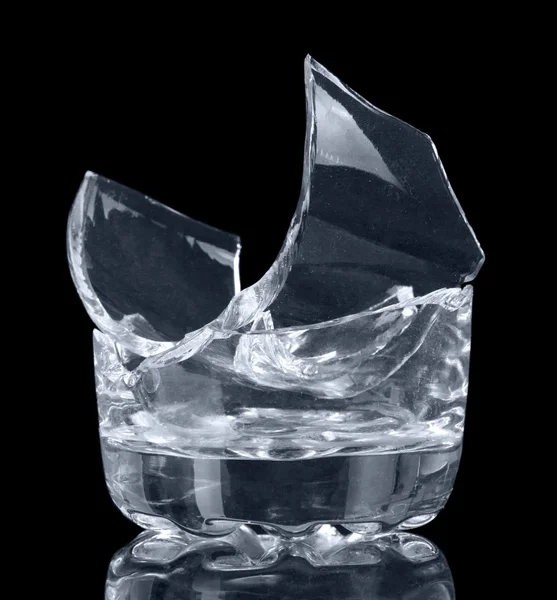 Broken glass beaker isolated on  black background. — Stock Photo, Image