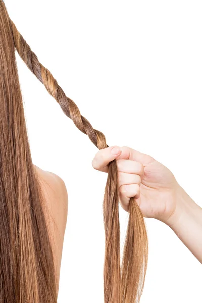 Trecce parrucchiere per capelli lunghi laccio emostatico isolato su sfondo bianco . — Foto Stock
