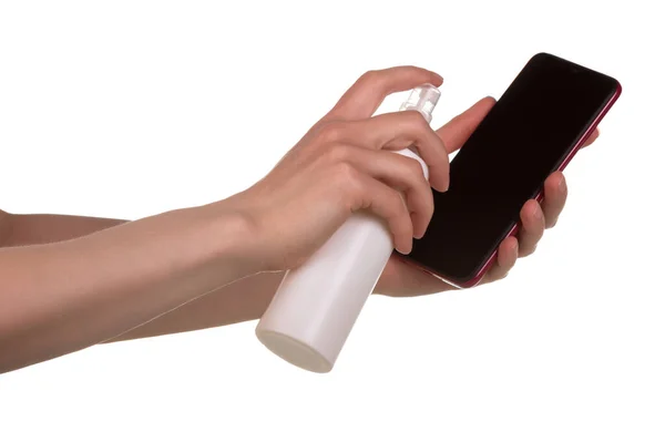 Дезинфекция Телефона Женские Руки Распыляют Антисептик Телефон Изолированы Белом Фоне — стоковое фото
