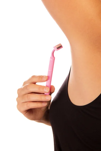 Woman shaving armpit — Stock Photo, Image