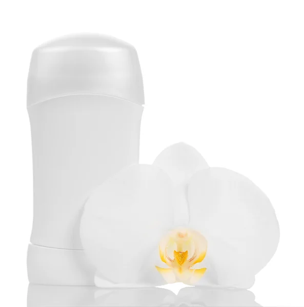 Cosméticos y flor de orquídea — Foto de Stock