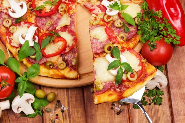 Pizza  on table — Stock Photo, Image