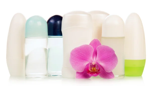 Deodoranti e fiori di orchidea — Foto Stock