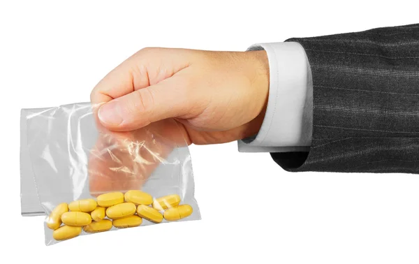 Mužské ruky s balíčkem léků — Stock fotografie