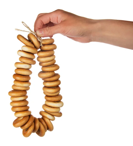 Bunch of bagels in female hand — Stock Photo, Image