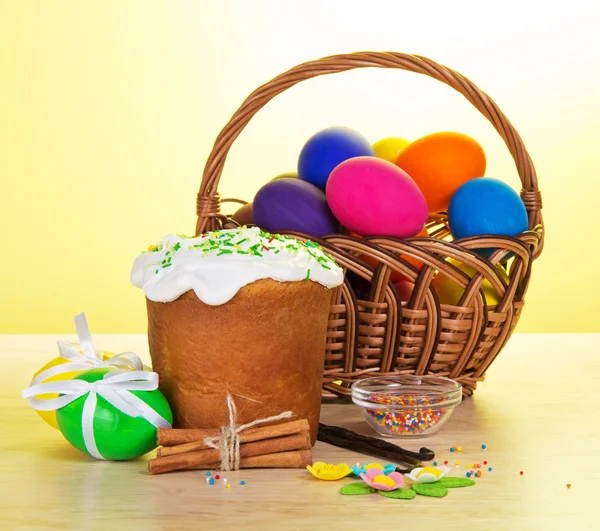 Easter eggs in wicker basket — Stock Photo, Image