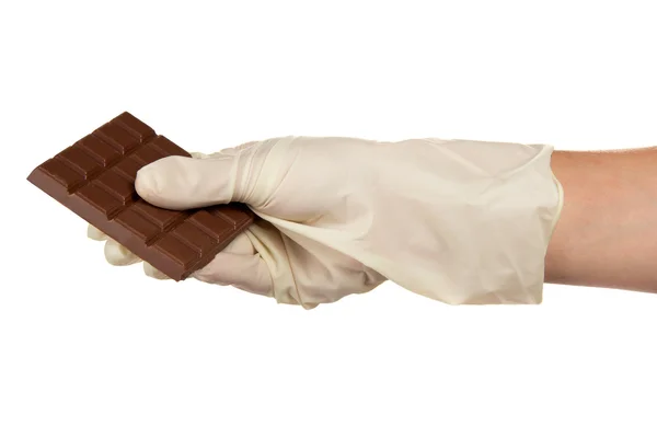 Melk chocolade in banketbakker hand — Stockfoto