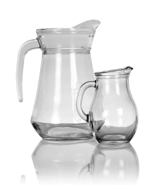 Empty glass pitchers — Stock Photo, Image