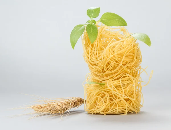 Uncooked italian pasta — Stock Photo, Image