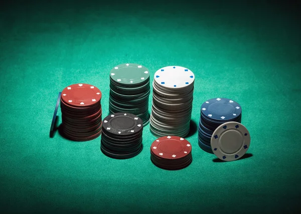 Poker chips on cloth — Stock Photo, Image