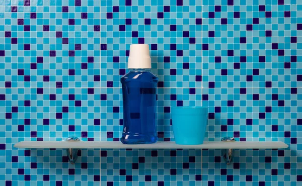 Mouthwash on bath shelf — Stock Photo, Image