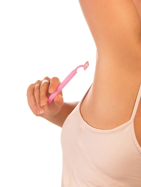 Woman shaving armpit — Stock Photo, Image