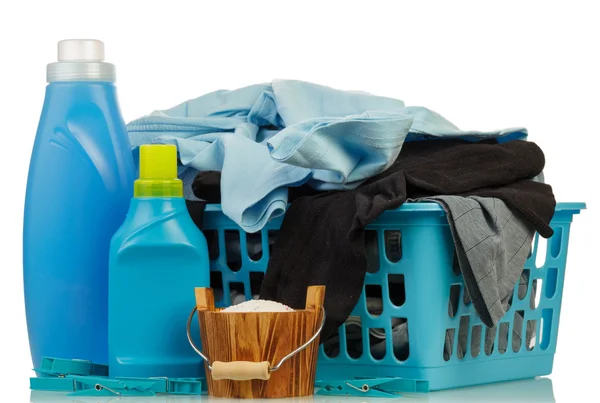 Detergents and clothes in baske — Stock Photo, Image