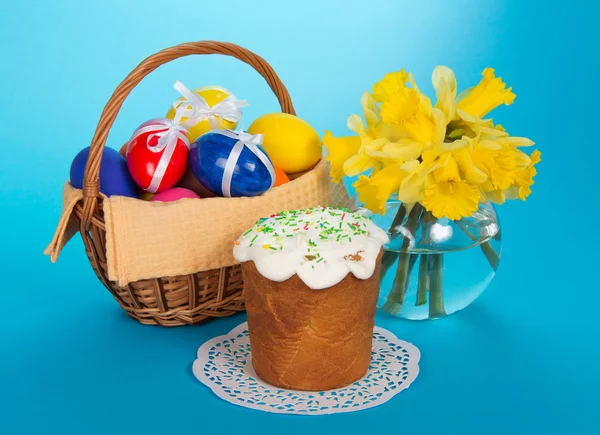 Cake, eggs in a basket — Stock Photo, Image