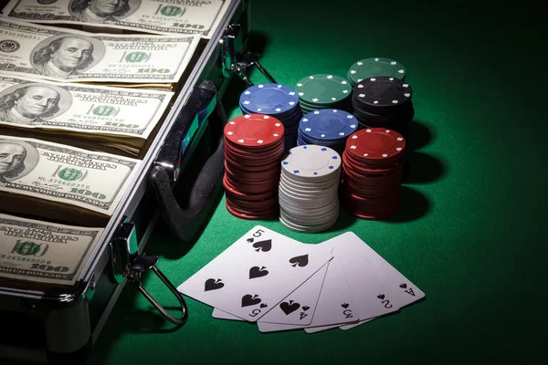 Poker chips and dollar bills — Stock Photo, Image