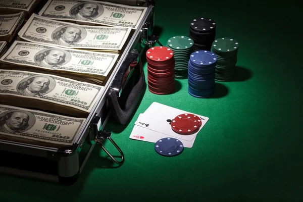 Poker chips and dollar bills — Stock Photo, Image