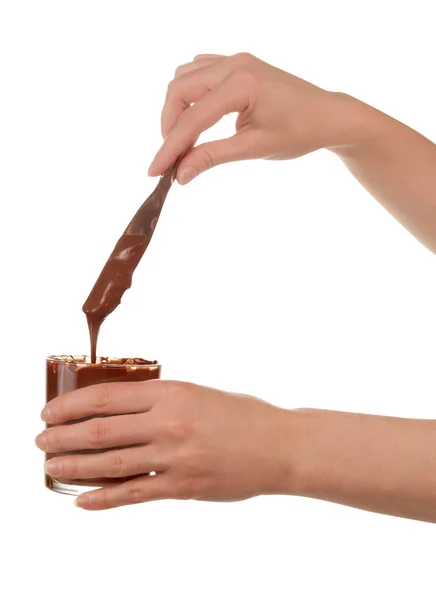 Hands spreads chocolate paste — Stock Photo, Image