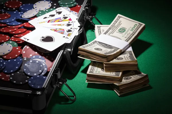 Poker chips and dollar bills — Stock Photo, Image