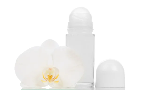 Deodorantlar ve orkide çiçek — Stok fotoğraf