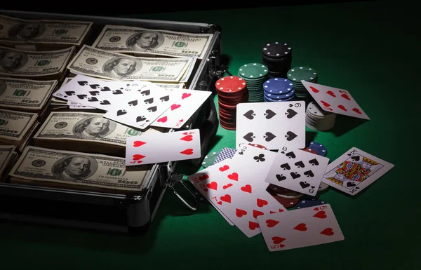 Poker chips and dollar bills — Stock Photo, Image