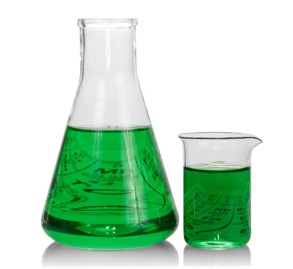 Chemical flasks with green liquid — Stock Photo, Image