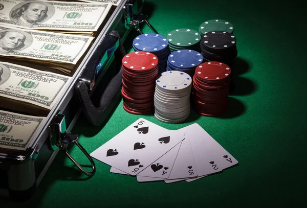 Poker chips and dollar bills — Stock Photo, Image