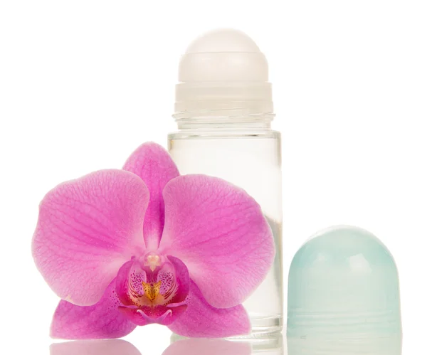 Deodorante e fiore di orchidea — Foto Stock