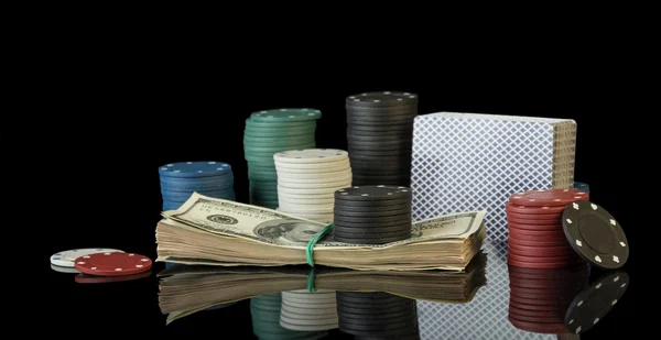 Poker chips and dollar bills — Stock Photo, Image