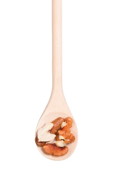 Walnuts on a wooden spoon — Stock Photo, Image