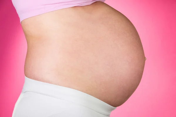 Belly of pregnant woman — Stock Photo, Image