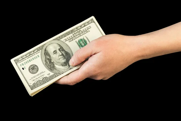 Деньги в человеческой руке — стоковое фото