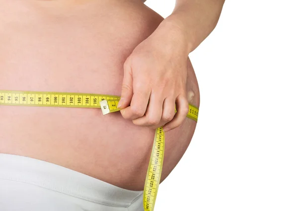 Pregnant woman measuring bump — Stock Photo, Image