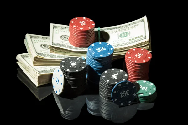 Poker chips and dollar bills — Stock Photo, Image