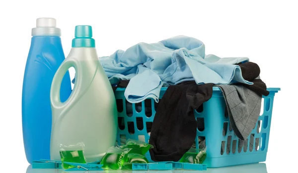 Clothes with detergent in basket — Stock Photo, Image