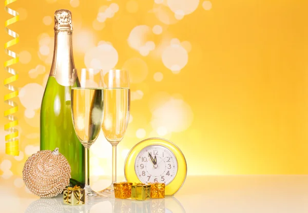 Bottle and two glasses of champagne — Stock Photo, Image