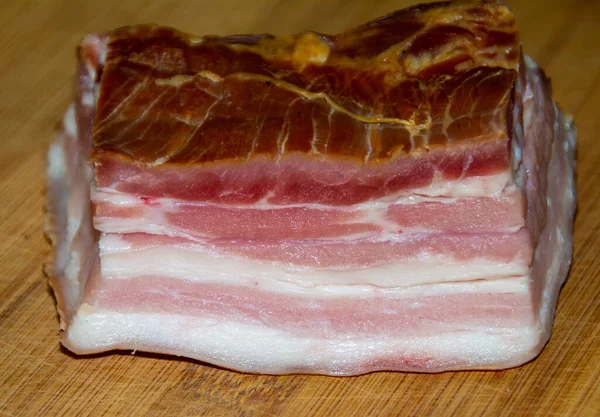 Närbild Bit Bacon Träbord — Stockfoto