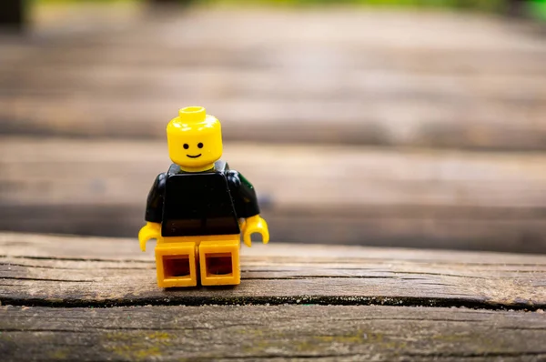 Poznan Poland Oct 2020 Lego Man Figurine Sitting Wood Having — Stock Photo, Image