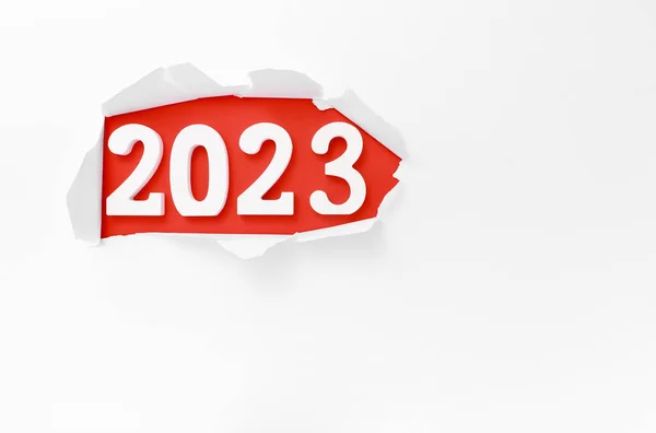 2023 Escrito Atrás Livro Branco Rasgado Sobre Fundo Vermelho — Fotografia de Stock