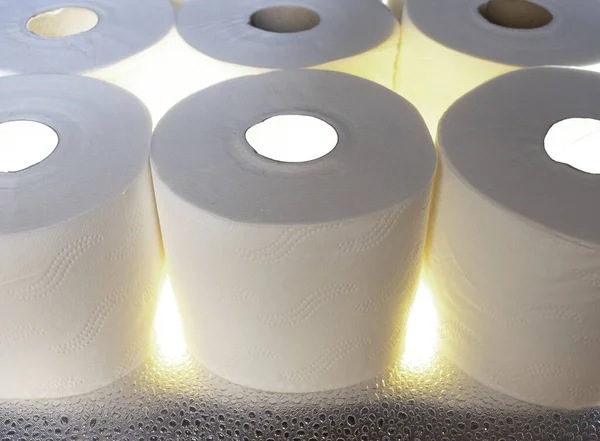 Closeup Toilet Paper Rolls Table Lights — Stock Photo, Image
