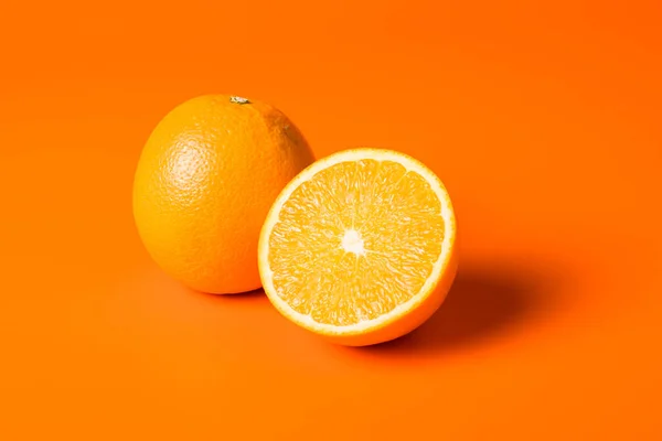 Closeup Shot Ripe Half Cut Orange Orange Background — ストック写真