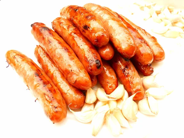 Closeup Shot Pile Delicious Cooked Juicy Sausages Garlic Cloves — Stock Photo, Image