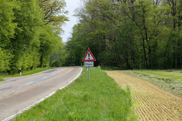 Warning Road Sign Edge Road German Text Oil Track — Stock Photo, Image