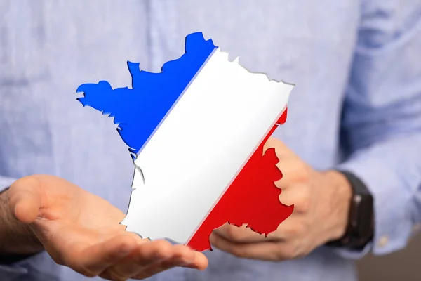 Ein Geschäftsmann Hält Die Frankreich Landkarte Mit Den Farben Der — Stockfoto