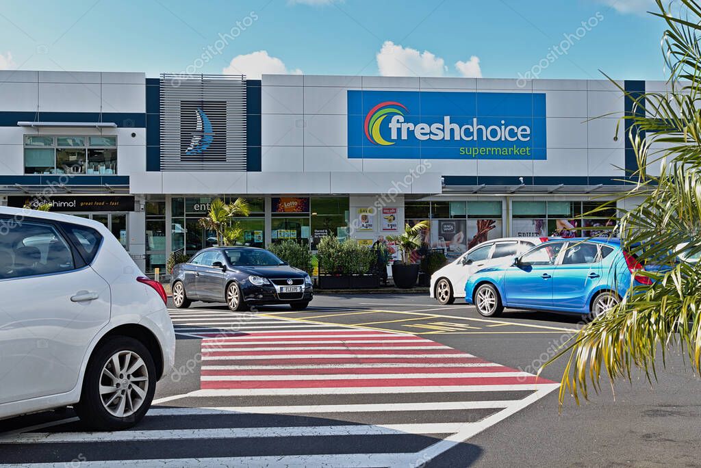 AUCKLAND, NEW ZEALAND - Aug 07, 2019: View of Fresh Choice supermarket at Half Moon Bay Marina from car park on bright sunny day
