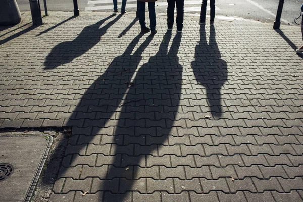 Closeup Shadows People Cobble Street Warsaw Poland Stock Picture
