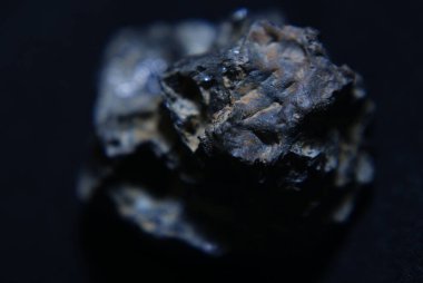 A closeup shot of black scientific mineral specimen clipart