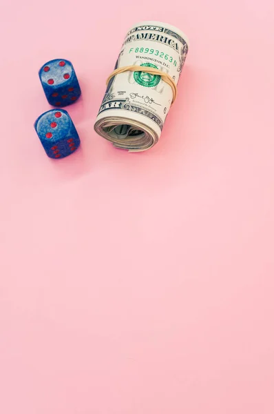 Bundle Rolled American Banknotes Two Dice Isolated Pink Background — Stock Photo, Image